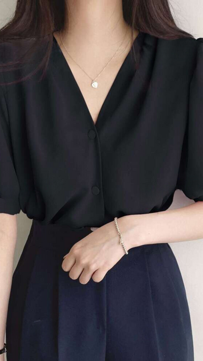 Zeitlose Puffärmelbluse für Damen.