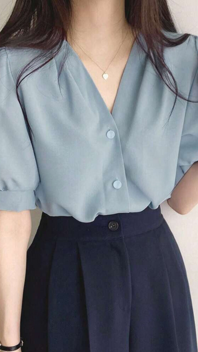 Klassische Puffärmelbluse für Damen.