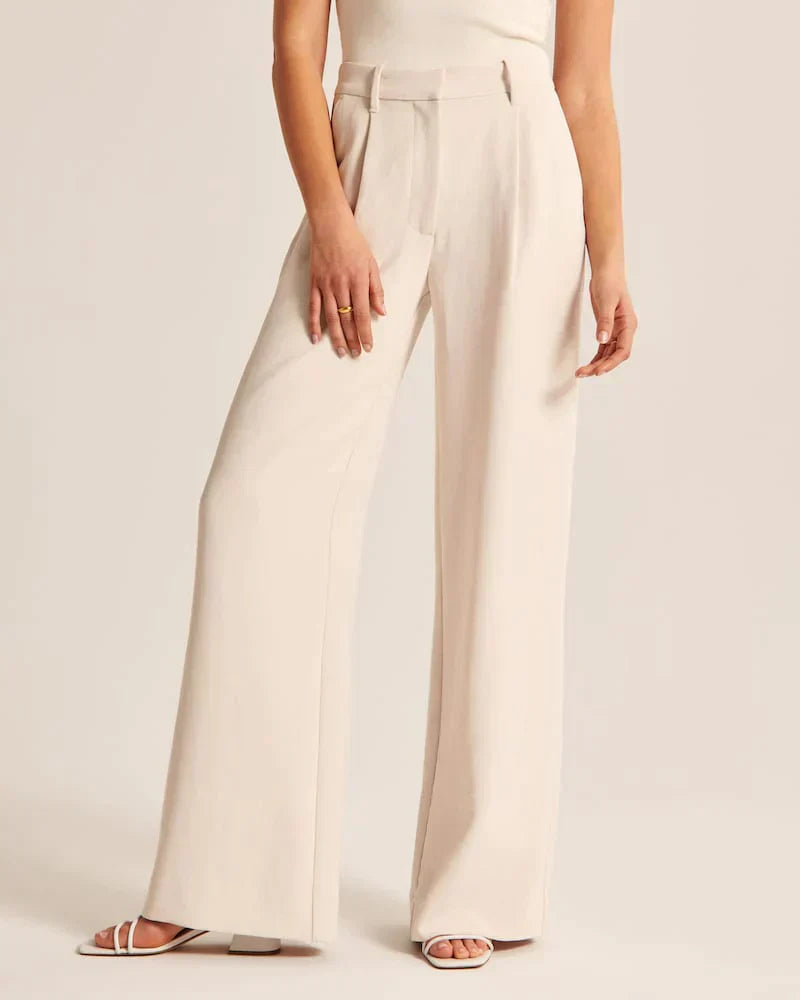 Raffinierte weiße maßgeschneiderte Hose von Aphrodite™.
