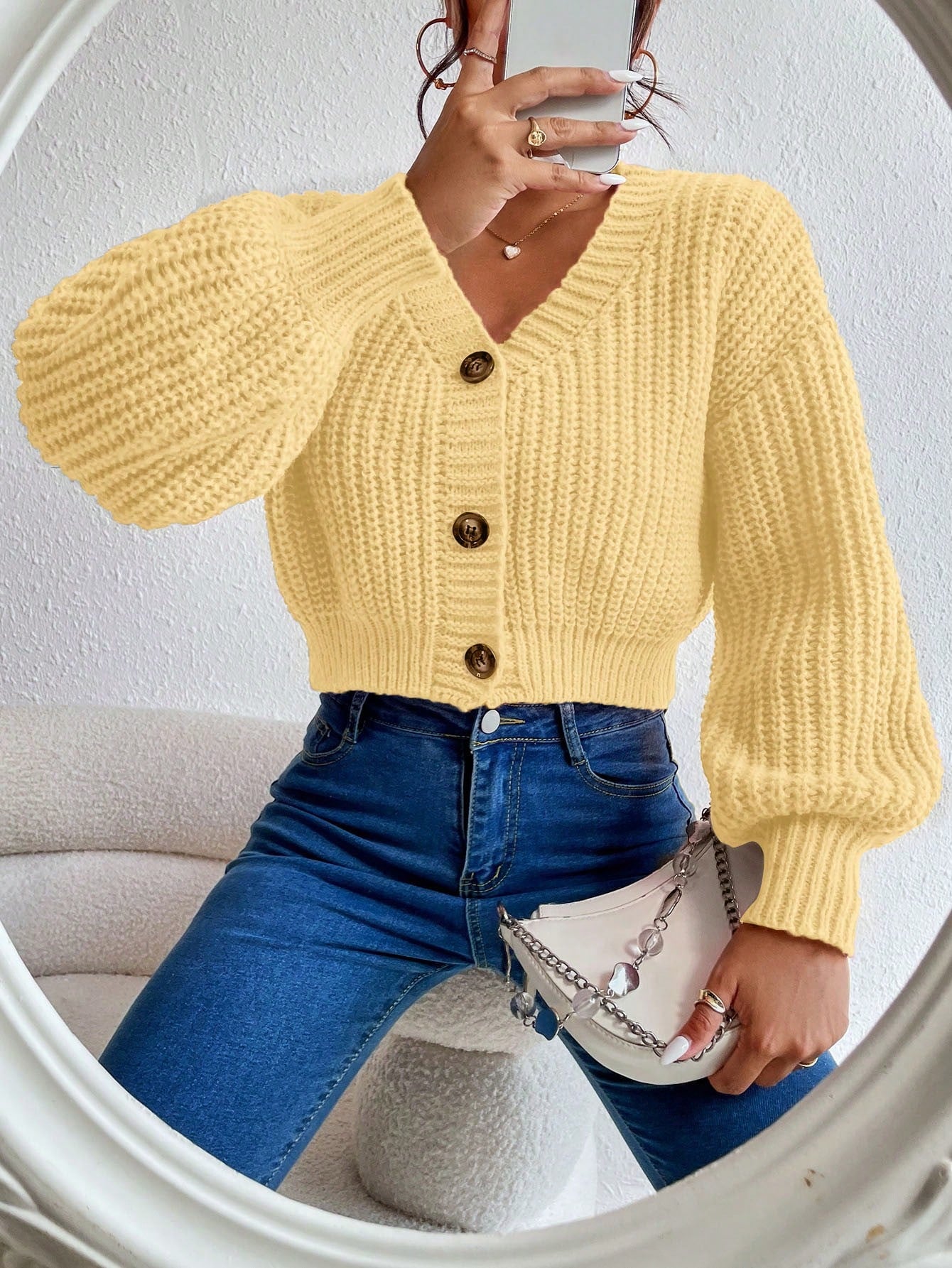 Hochwertiger Cardigan aus atmungsaktivem Stoff.