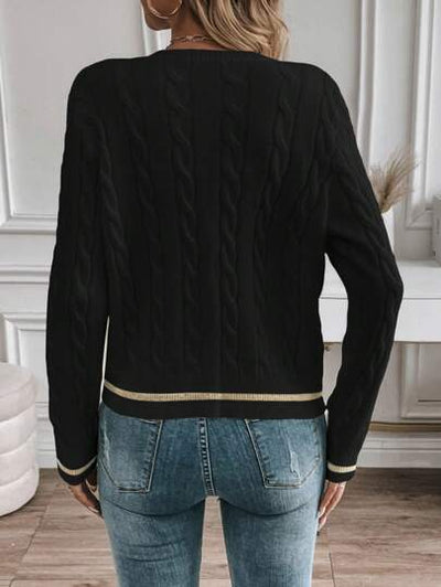 Klassische Damenstrickjacke für besondere Anlässe.