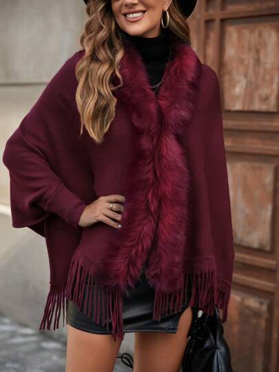 Leichte und warme Strickjacke mit Fledermausärmeln.
