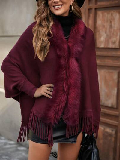Leichte und warme Strickjacke mit Fledermausärmeln.
