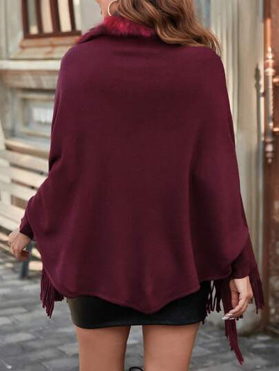 Strapazierfähige und schicke Strickjacke mit Patchwork-Details.

