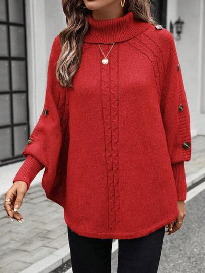 Asymmetrischer Saumpullover, perfekt für Herbstlagen.
