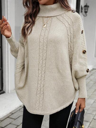 Dekorative Knöpfe verleihen dem Winterpullover Charme.
