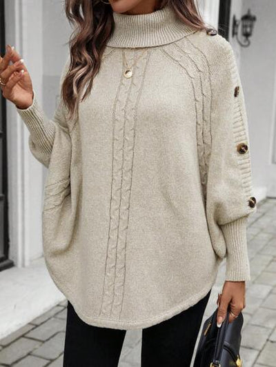 Dekorative Knöpfe verleihen dem Winterpullover Charme.
