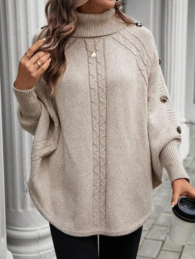 Hochgeschlossener Pullover mit Fledermausärmeln für kalte Tage.
