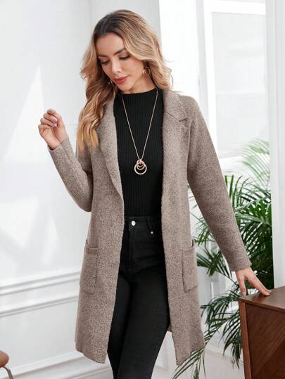 Kuscheliger Cardigan mit praktischen Vordertaschen von Aphrodite™.
