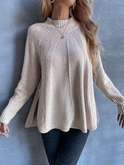 Eleganter Pullover mit Raglanärmeln für mühelose Bewegungsfreiheit.

