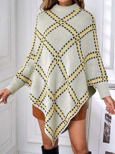 Weicher, atmungsaktiver Poncho mit asymmetrischen Details von Aphrodite™.
