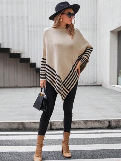 Aphrodite™ Poncho mit auffälligem Streifenmuster und asymmetrischem Saum.
