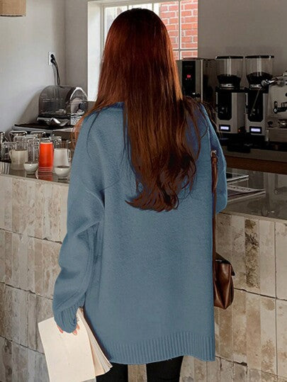 Einfarbiger Pullover mit gemütlichem Rollkragen und lässigem Schnitt.
