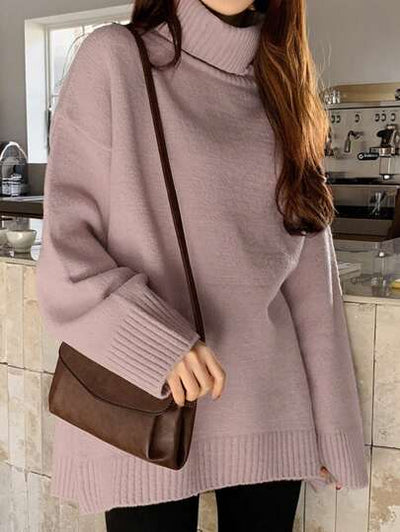 Eleganter Langarmpullover mit gemütlichem Rollkragen.
