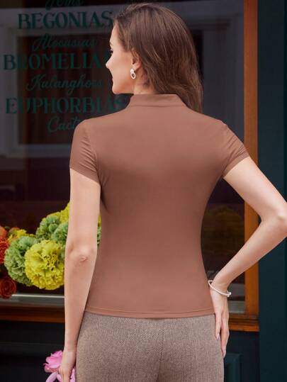 Aphrodite™ Vintage-Stricktop mit eleganten Details.
